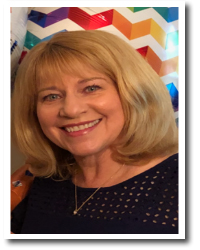 Dawn Shonk Preschool Teacher Dawn Shonk, woman with shoulder length blonde hair, wearing a black top and gold necklace