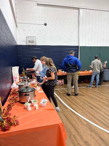 Guests sampling the chili cook-off