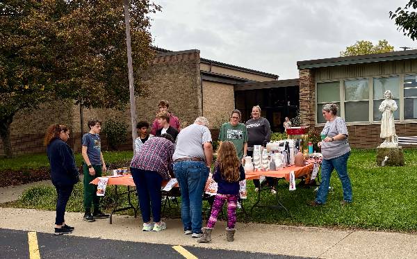 Cider and popcorn fundraiser table