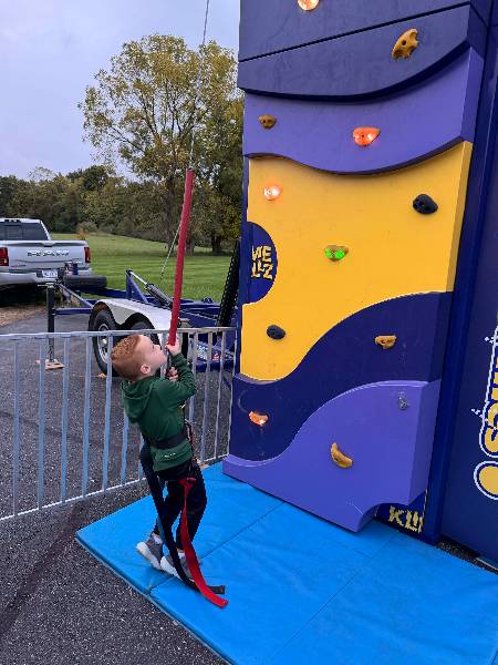 Young climber getting ready to start