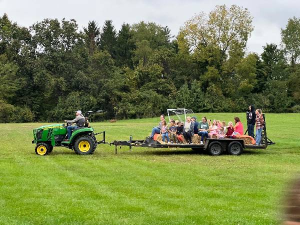 Tractor hayride across the field