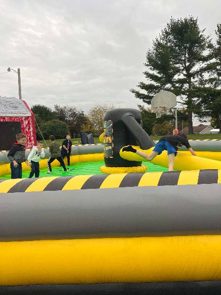 Kids jumping the sweeper arm on Toxic Meltdown