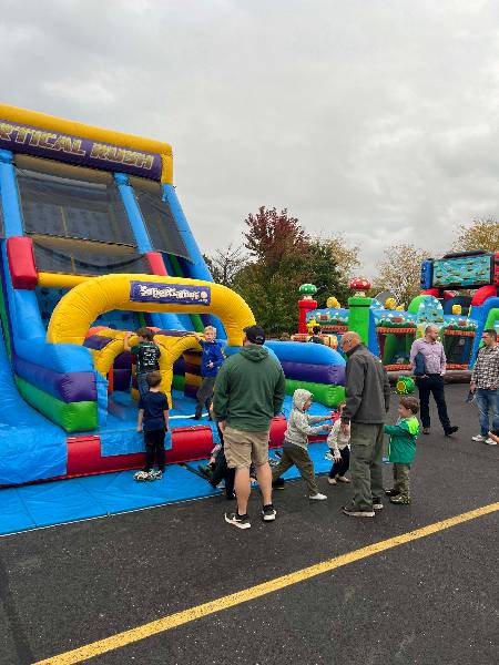 Kids lining up at the Vertical Rush slide