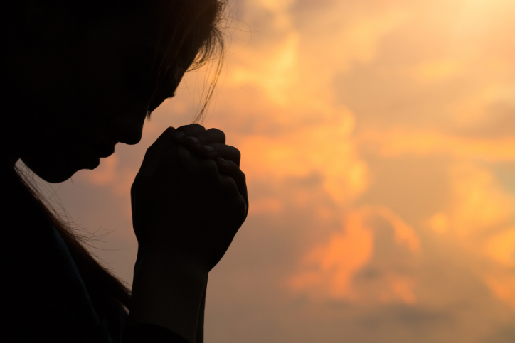 prayer shadow of a lady praying