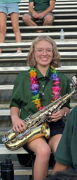 Saxophonist smiling in the stands