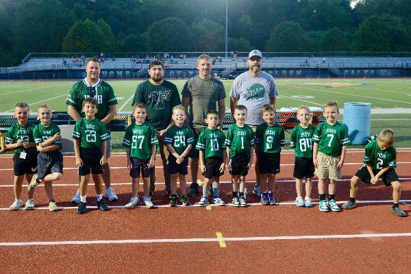 Flag football team with coaches