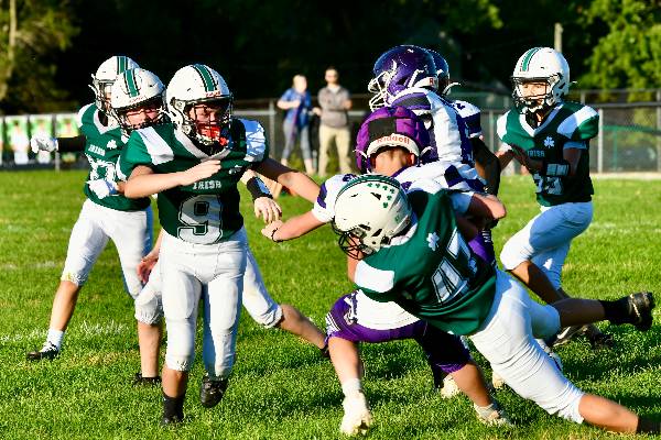 Irish defense swarms the ball carrier