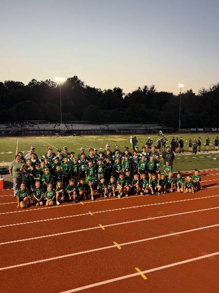 Irish youth teams group photo at dusk